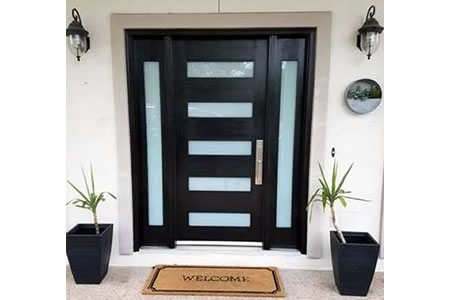 Contemporary entry wood door with two sidelites